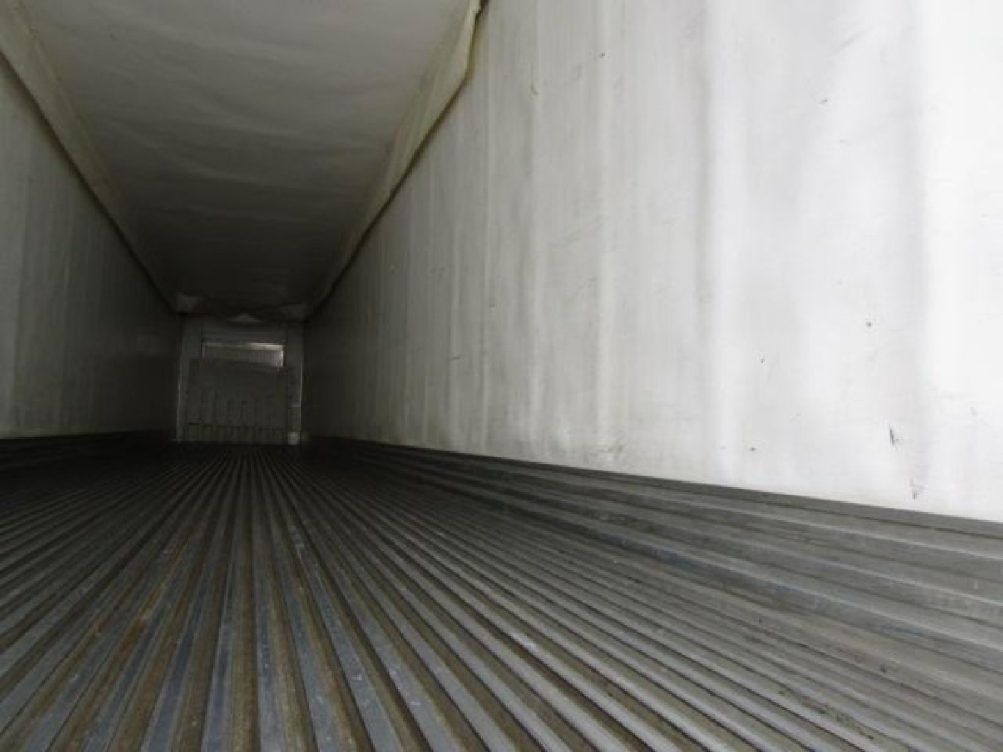 Interior of a 2019 Utility refrigerated trailer trailer floor with ribbed metal and walls; no visible labels or text inside.