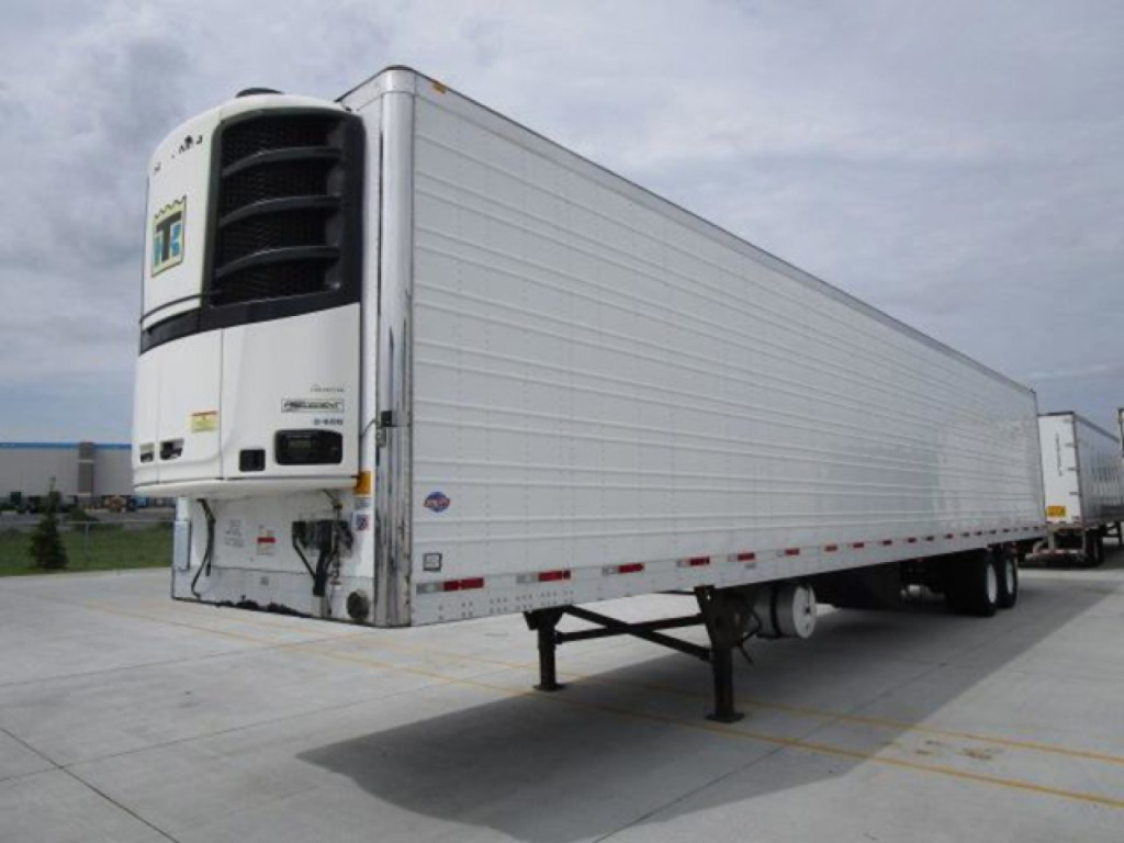 Trailer refrigeration unit on a 2019 utility reefer trailer with white corrugated sidewalls and front refrigeration unit.