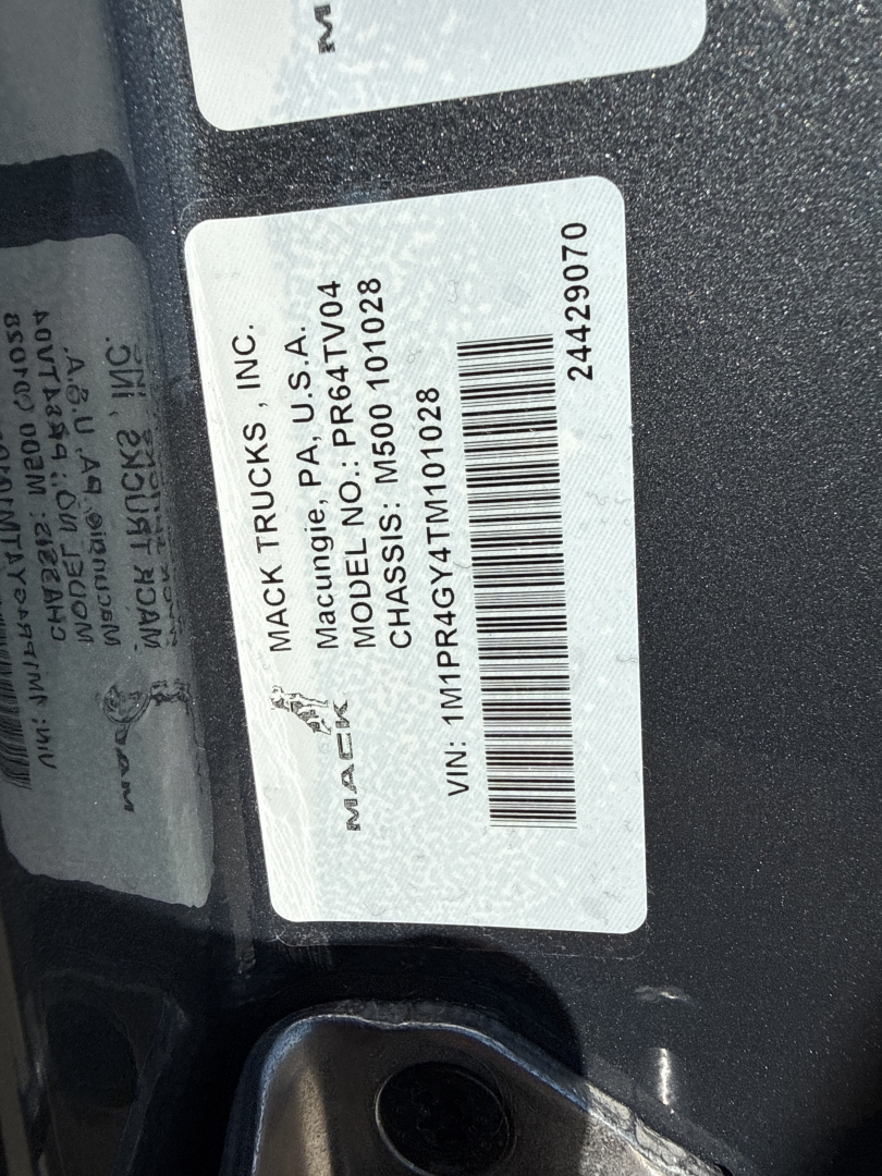 Mack Trucks sticker with VIN 1MPR4GY4TM101028, Model M50 ??, Chassis 1M501?0528, 24429070 barcode, MAC K Trucks Inc., Models PA, USA, CHASSIS M500 101028. Plate shows MACK TRUCKS INC, MADE IN U.S.A. VIN 1MPR4GY4TM101028.