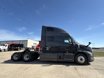 Mack PR64T76H semi-truck tractor side profile showing sleeper cab and dual rear axles.
