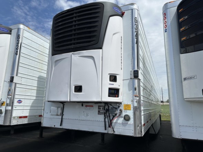 Trailer front view of a 2015 Utility 3000R refrigerated trailer with thermoelectric unit, black grille, and raised landing gear; visible stock number UE11678 and VIN label.