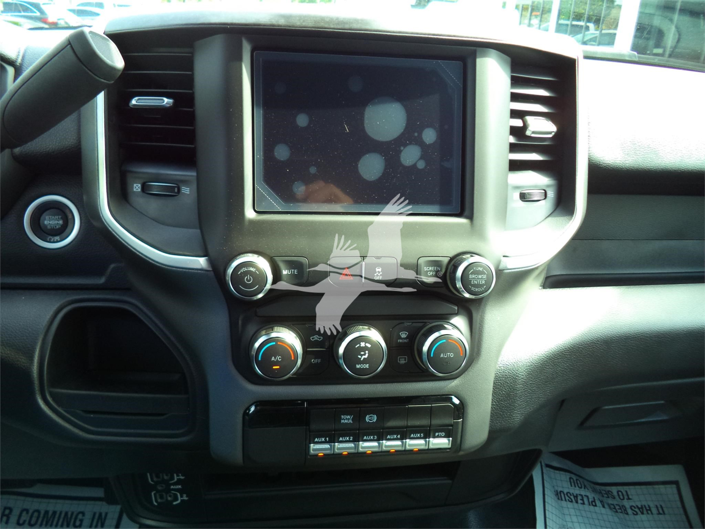 Ram 5500 dashboard center console with touchscreen display and climate controls visible.