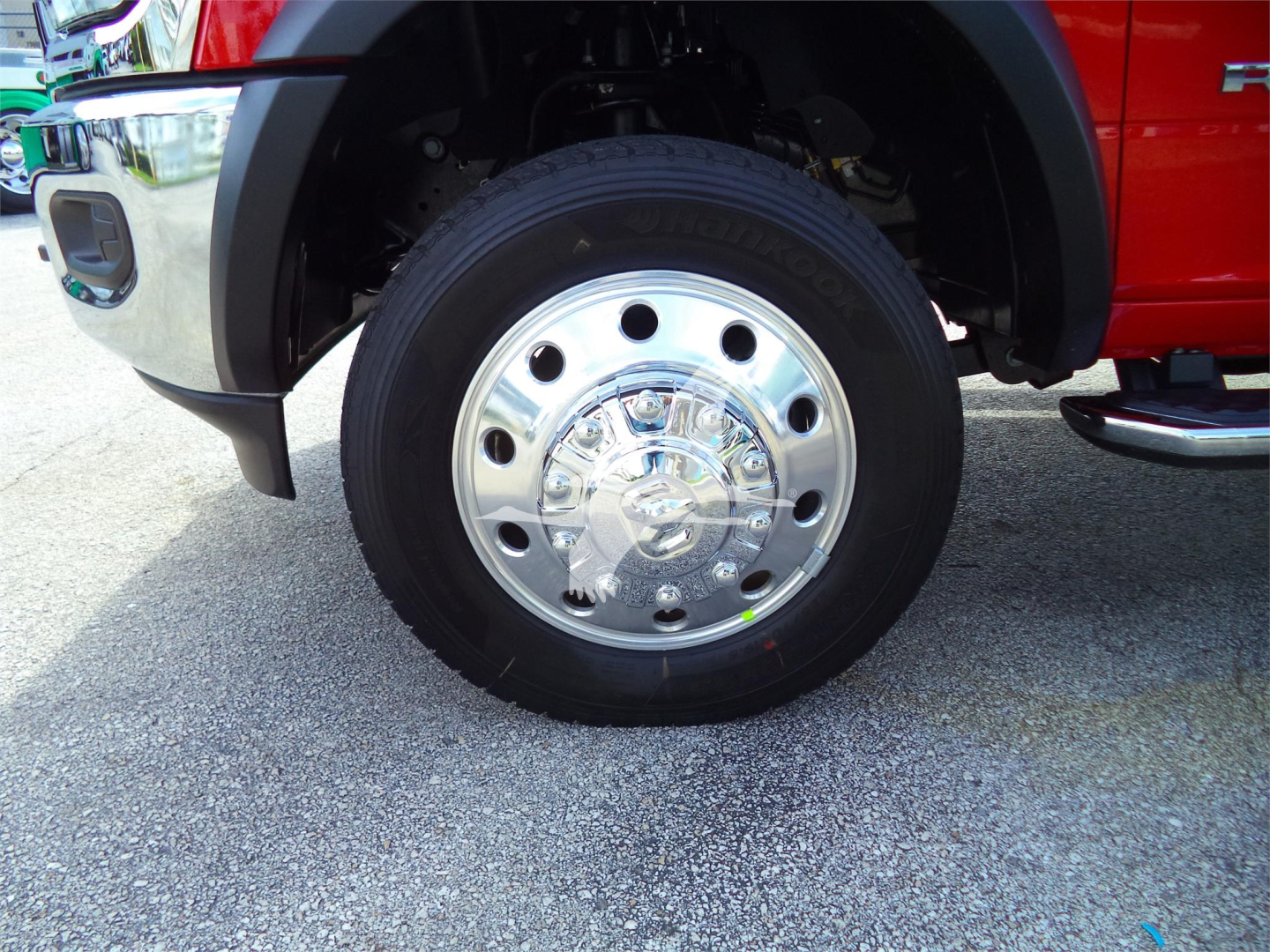  Ram 5500 front wheel showing chrome hubcap and tire.