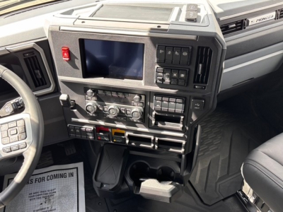 Mack PR64T76H dash and center console showing touchscreen display and control panels.