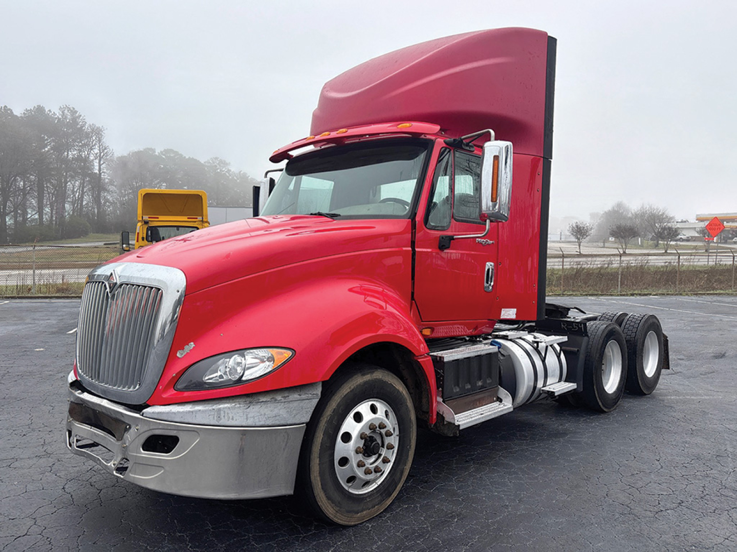 2014 International ProStar truck cab in red with sleeper, side view showing VIN 1HSDJSNR4EH095096, stock 552295, conventional daycab, used.
