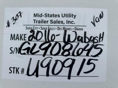 Label on trailer showing Mid-States Utility Trailer Sales, Inc. with handwritten data: Make 20/10-Wabash, S/N GL9086015, STK # U90915.