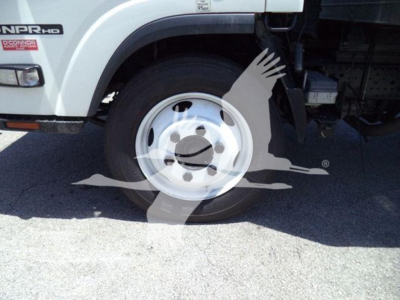 Isuzu NPR truck wheel and front fender visible with 2020 model badge and wheel covers. Side badge reads NPR-HD and O'Conner logo near front.