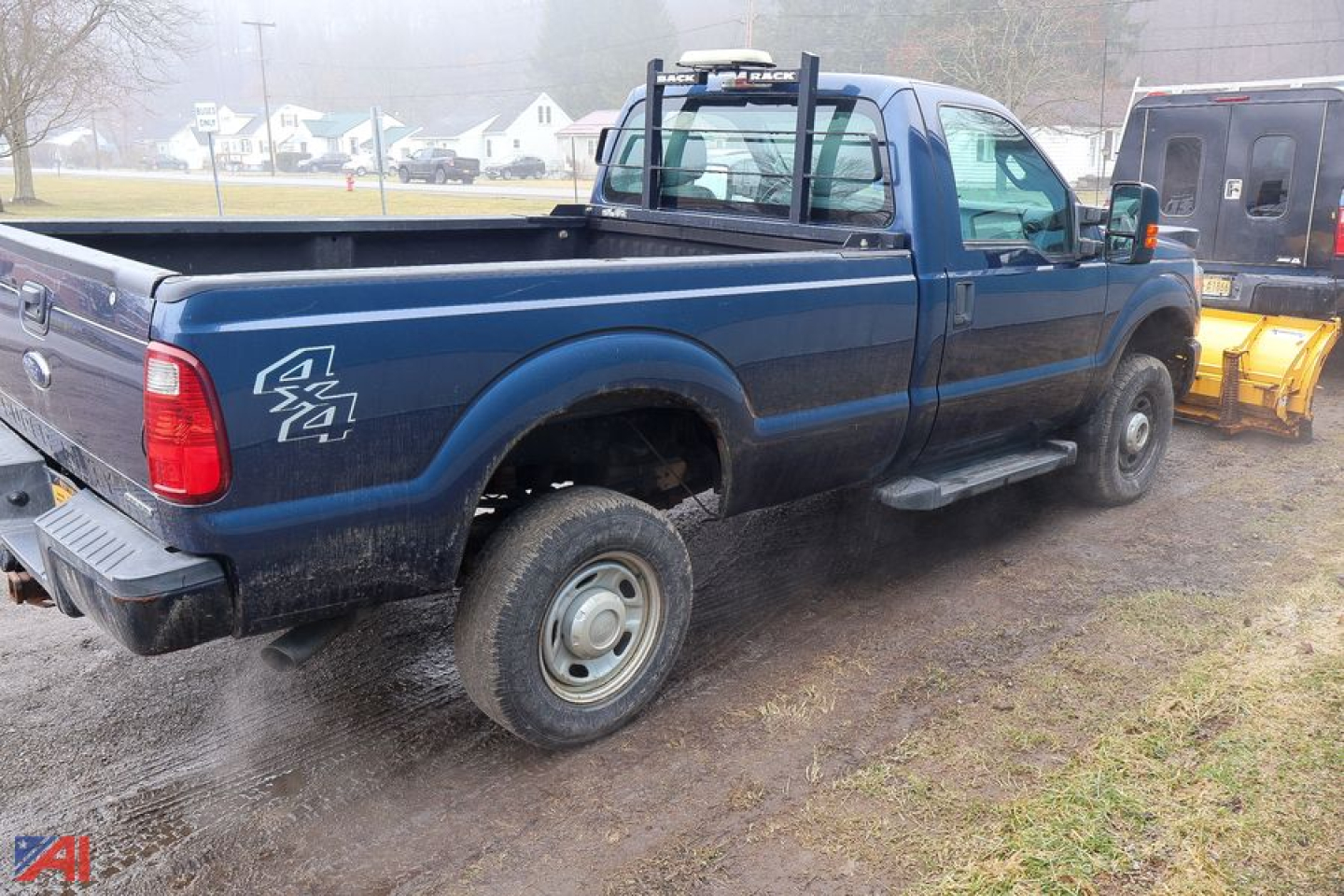 Ford F-350 Super Duty pickup with single rear wheel showing 4x4 badge and bed in view.