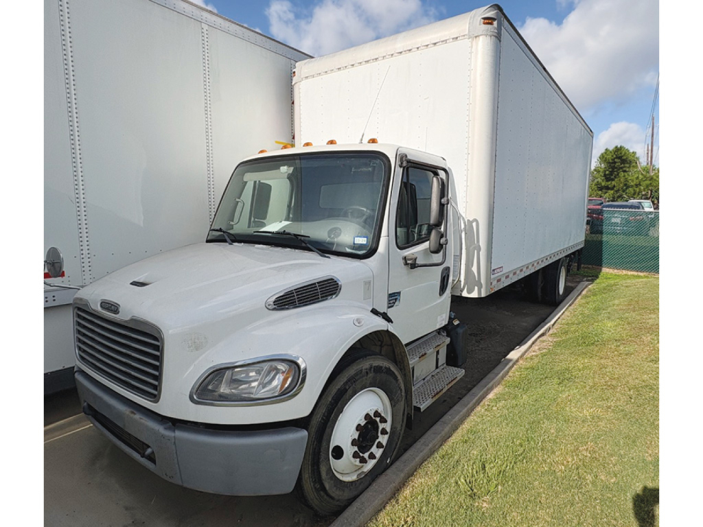 Truck cab and box of a 2017 Freightliner M2 106 Business Class conventional daycab with a large white box trailer attached.