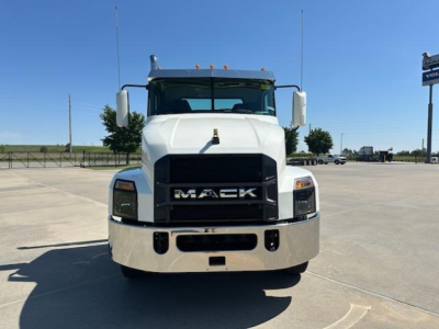 New 2026 Mack AN64T front view showing bold grille with MACK emblem, large bumper, and cab mirrors.