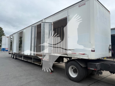 Trailer moving van side view showing open cargo doors, white exterior with faint numbers 16214AE near top front, and rear wheel.