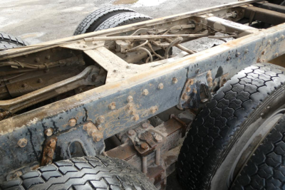  chassis and rear suspension of a Peterbilt truck showing frame, dual rear wheels, and drive components
