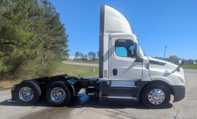 Freightliner Cascadia 126 day cab showing side profile with sleeper cab, wheels, and chassis.