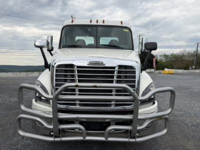 Front view of a 2017 Freightliner Cascadia CA125DC conventional daycab truck with a heavy-duty grille guard.