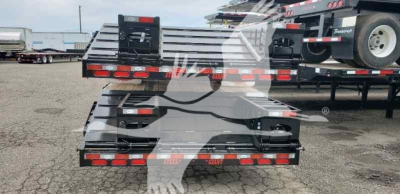 Trailer rear view showing drop deck beavertail with taillights and hitch area, 2020 Dorsey Beavertail trailer, used stock number 53-5948, VIN 5JYDF5324LED16183.