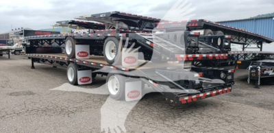 Trailer stack showing Dorsey Beavertail trailer with beavertail and dual deck layout, black with red and white reflective tape, wheels, and landing gear visible.
