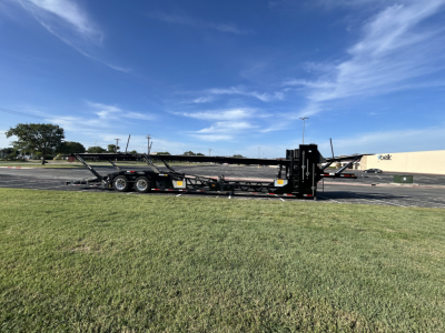 Cottrell CX-5308LT car carrier trailer side view showing frames and hitch