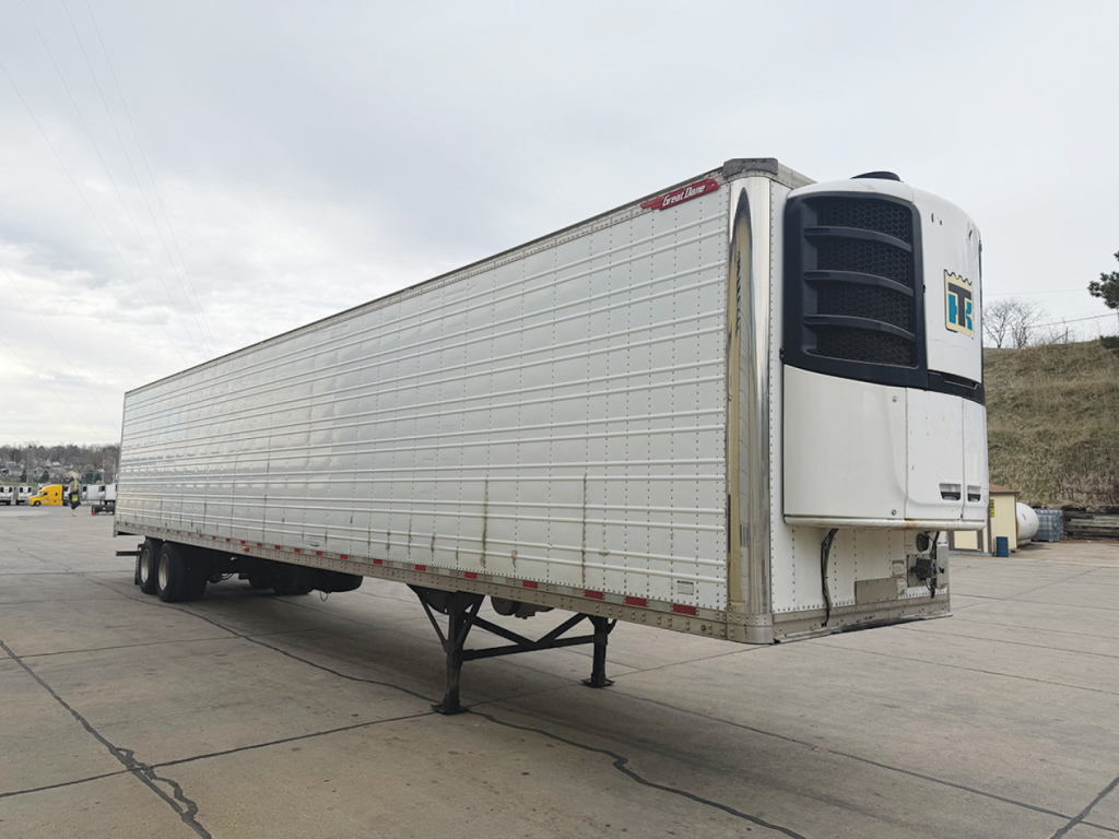 Great Dane Everest SS refrigerated trailer in yard showing front refrigeration unit and side paneling