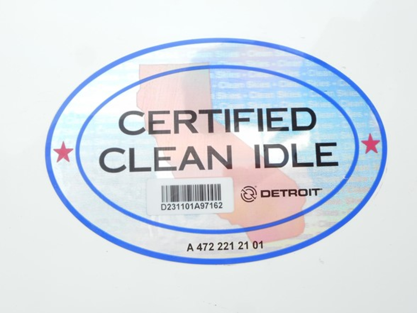 Sticker reading CERTIFIED CLEAN IDLE with barcode and Detroit logo on white surface.