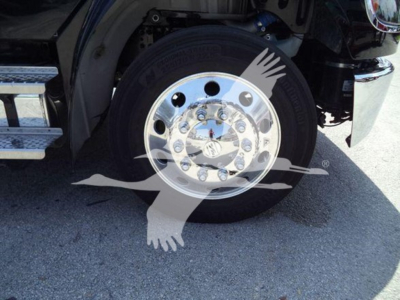 Freightliner M2 106 Plus front wheel and chrome hub showing polished alloy rim and tire.