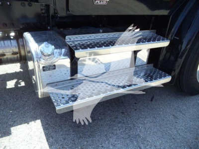 Truck side with aluminum two-step running board and fuel tank on Freightliner M2 chassis showing metal steps and surface details.