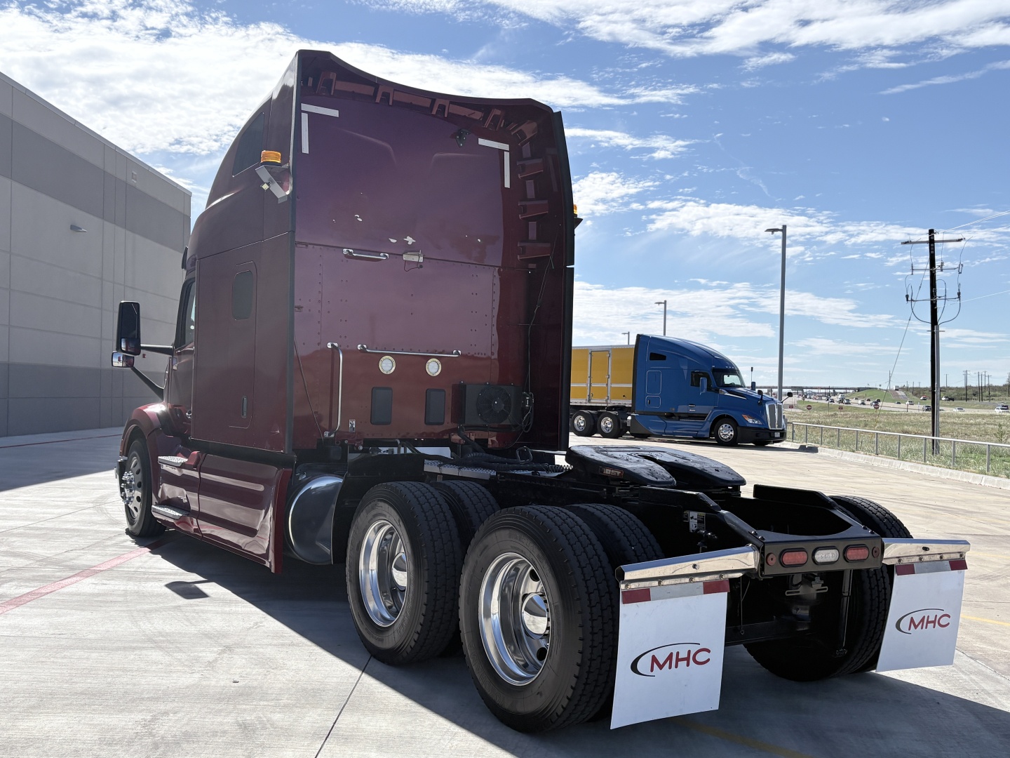 Peterbilt 579 truck rear view showing chassis and dual rear axles.