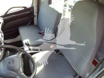 Interior of a 2017 Hino 258LP cab showing driver and passenger seats with steering wheel.