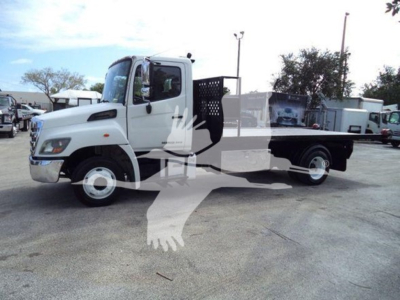 Hino 258LP hooklift truck in white, side profile view showing cab and flatbed with hooklift mechanism.