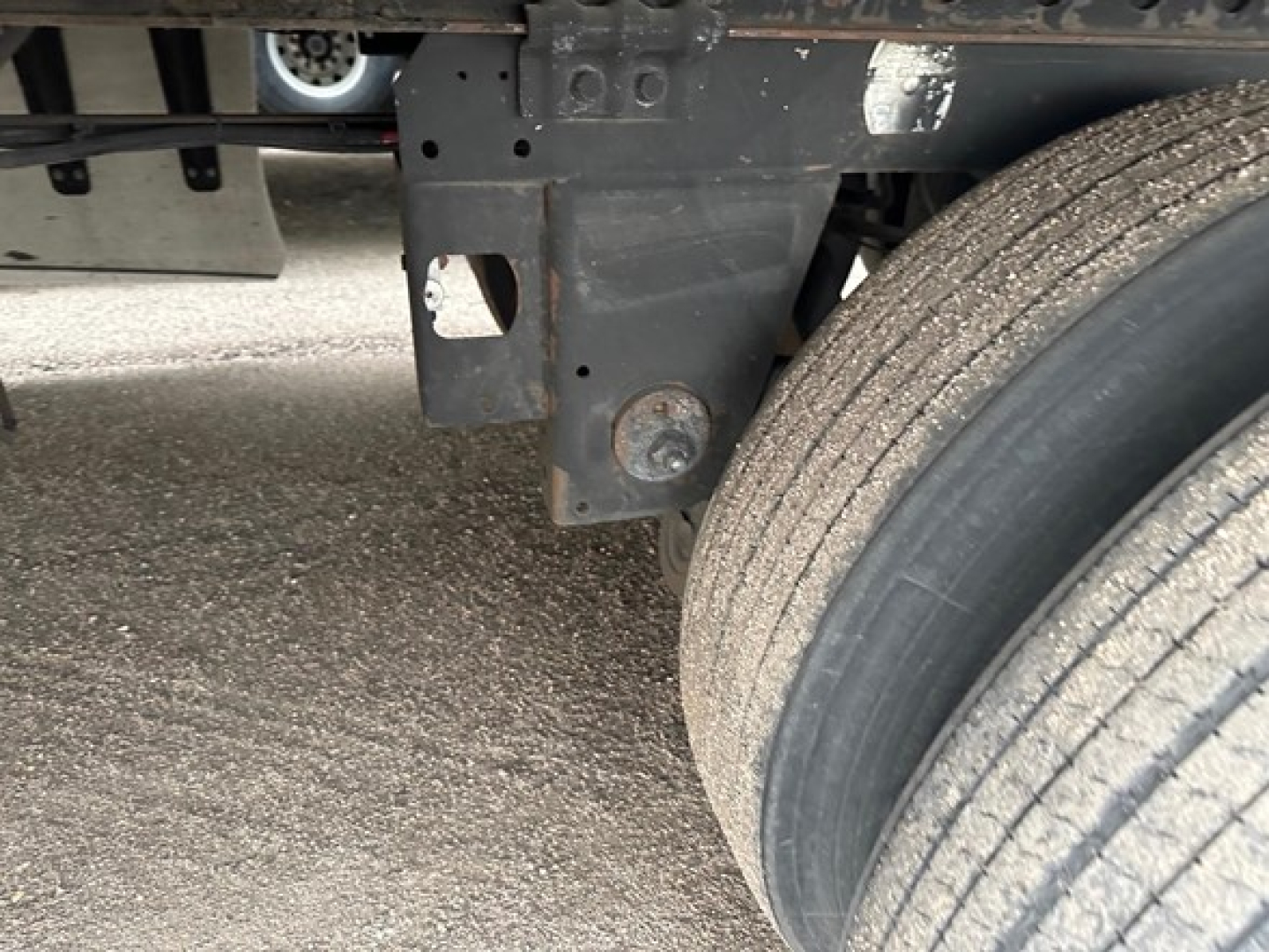 Rear undercarriage of a Hyundai dry van trailer showing dual rear tires and frame components.