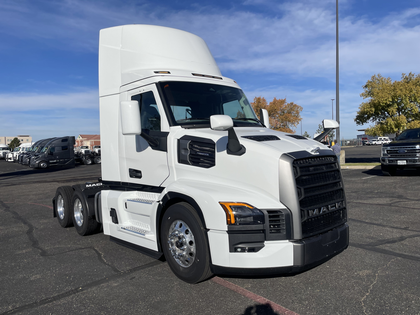 2026 Mack PR64T tractor cab showing front grille, headlights, and white exterior.
