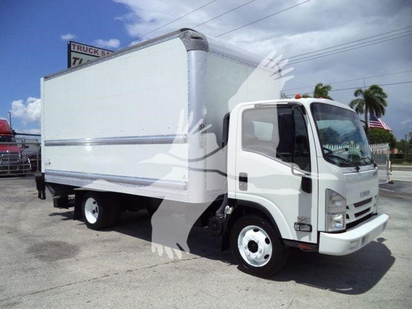 Isuzu NPR HD box truck shown in side/front view with white cab and aluminum box.