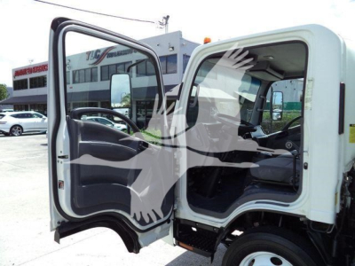 Isuzu NPR HD box truck cab with open doors showing interior seating and steering wheel.