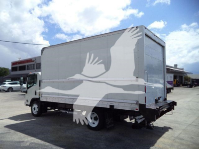 Isuzu NPR HD box truck with large white bird graphic on gray cargo area, side view showing rear ramp and bumper.