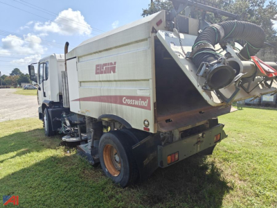 Autocar Xpert Sweeper truck rear view showing Crosswind body and hose assembly with 'EGIN' logo and exhaust components.