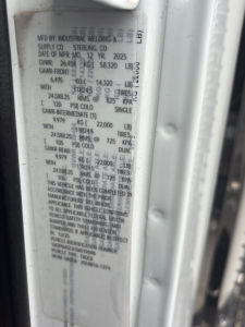 Mack PI64 vehicle door sticker showing manufacturing details: MFD BY INDUSTRIAL WELDING & SUPPLY CO STERLING CO; date of mfr 2025; GVWR 26,454 kg; GAWR values; tire specs.