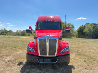 Kenworth T680 front view showing bold grille and headlights.”