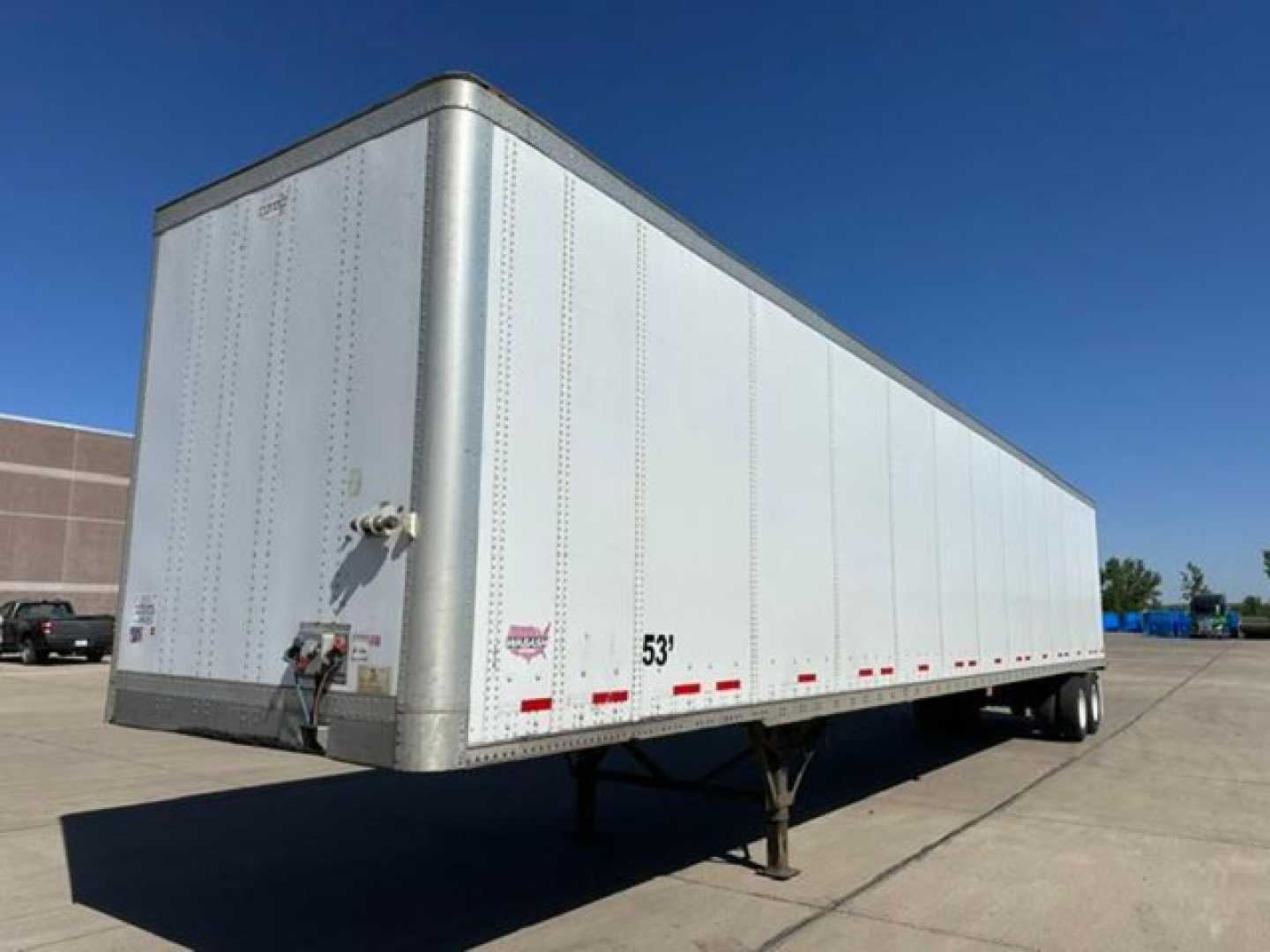 Trailer side of a 53' Wabash box van with front nose and landing gear visible. VIN 1JJV532D0EL812520 visible on listing.