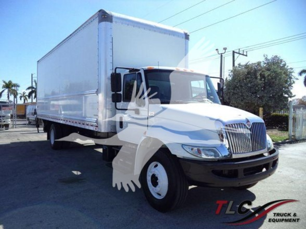 International Durastar 4300 box truck in view showing cab and large cargo box