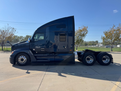 Kenworth T680 tractor side profile showing sleeper cab and dual rear wheels.