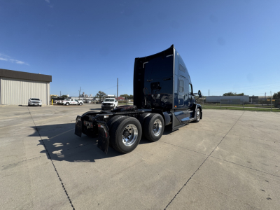 Kenworth T680 three-quarter rear view showing chassis and dual rear axles with sleeper cab