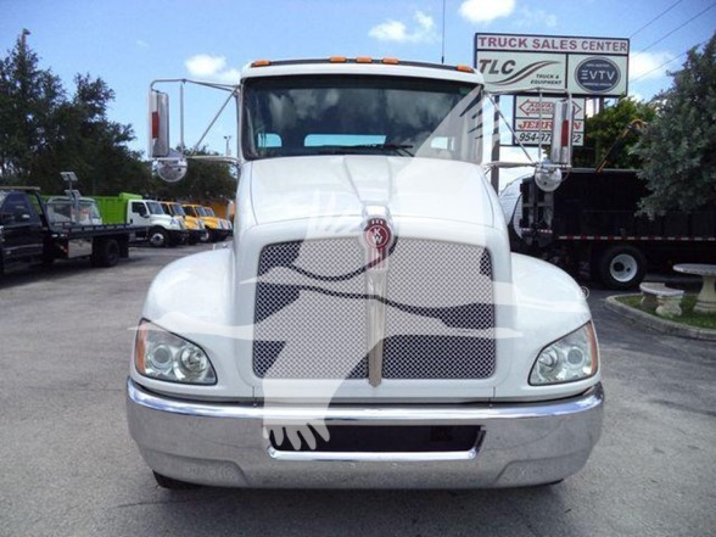 Kenworth T270 rollback truck front view showing grille and bumper with emblem and headlights.