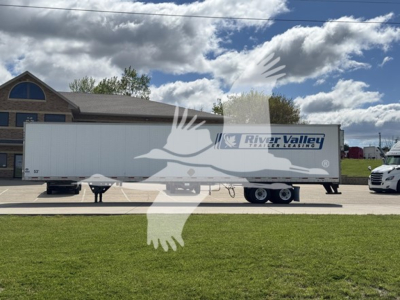 Trailer side view showing a long white Utility 4000Dx semi trailer with River Valley Leasing watermark across image.
