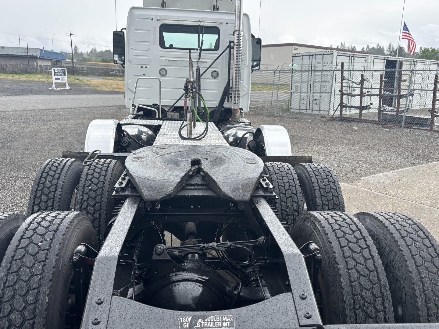 Volvo VNL Truck chassis showing rear undercarriage with dual rear axles and fifth-wheel area.