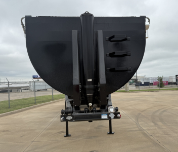 Armor Lite SHD32/48 dump trailer front view showing large black hopper and hitch assembly with support legs and mounting frame.