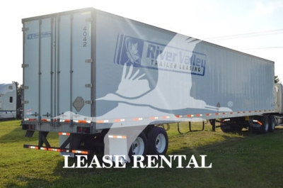 Trailer in side view showing River Valley Trailer Leasing graphics and LEASE RENTAL text on rear door, 2014 Utility 4000Dx with VIN 1UYVS2535EP898254 parked on grass.