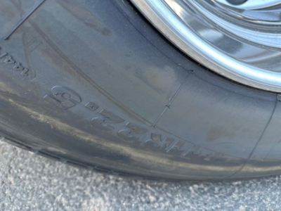 Tire sidewall close-up on a New 2026 Timpte Super Hopper trailer showing tire markings and tread area.