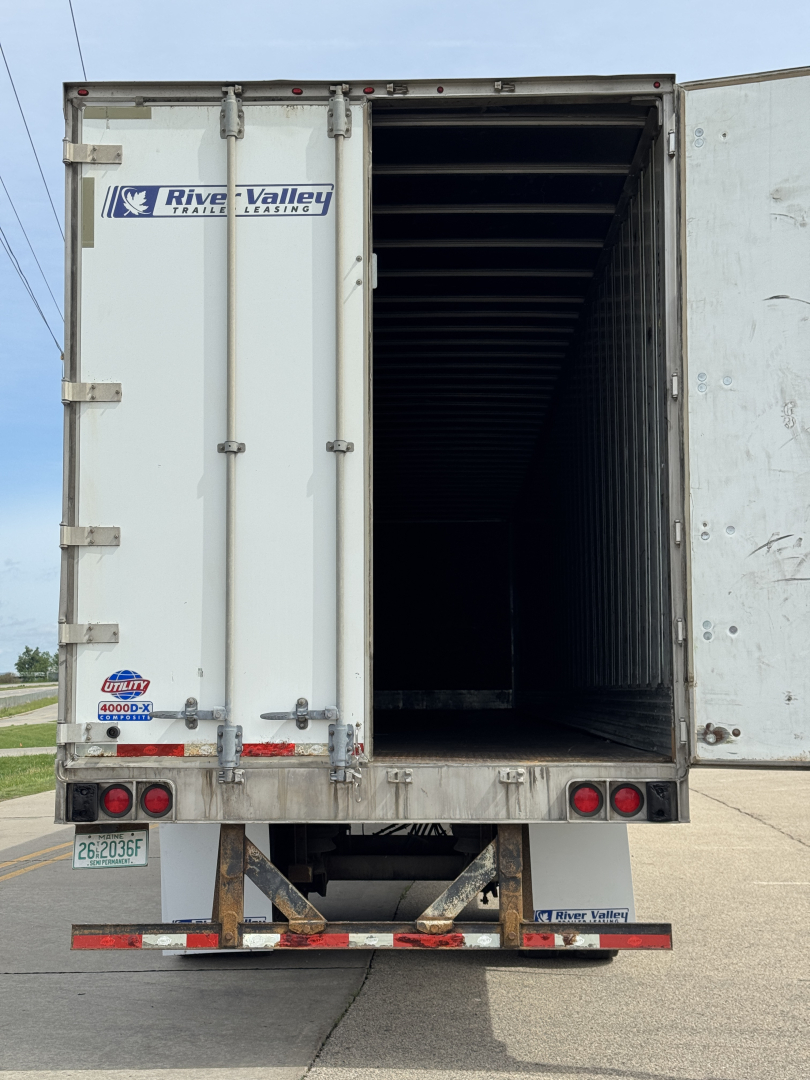 Rear view of a River Valley trailer with doors open showing interior cargo space