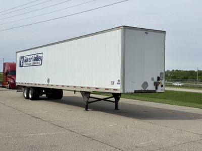  trailer showing River Valley Transport logo on a white cargo trailer with dual rear wheels and landing gear, side view, 53 ft