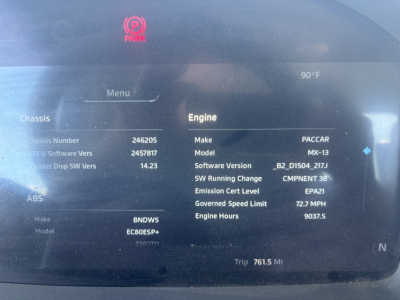 Engine display in Kenworth T680 showing Make PACCAR, Model MX-13, Software Version B2_D1504_217J, Emission Cert Level EPA1, Engine Hours 9037.5, GSL 72.7 MPH, Trip 761.5 MI, 90°F ambient, Vehicle chassis and ABS indicators