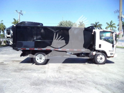 Isuzu NPR-HD dump truck in side view with black cargo body and white cab, stock number T15005FM, used vehicle.